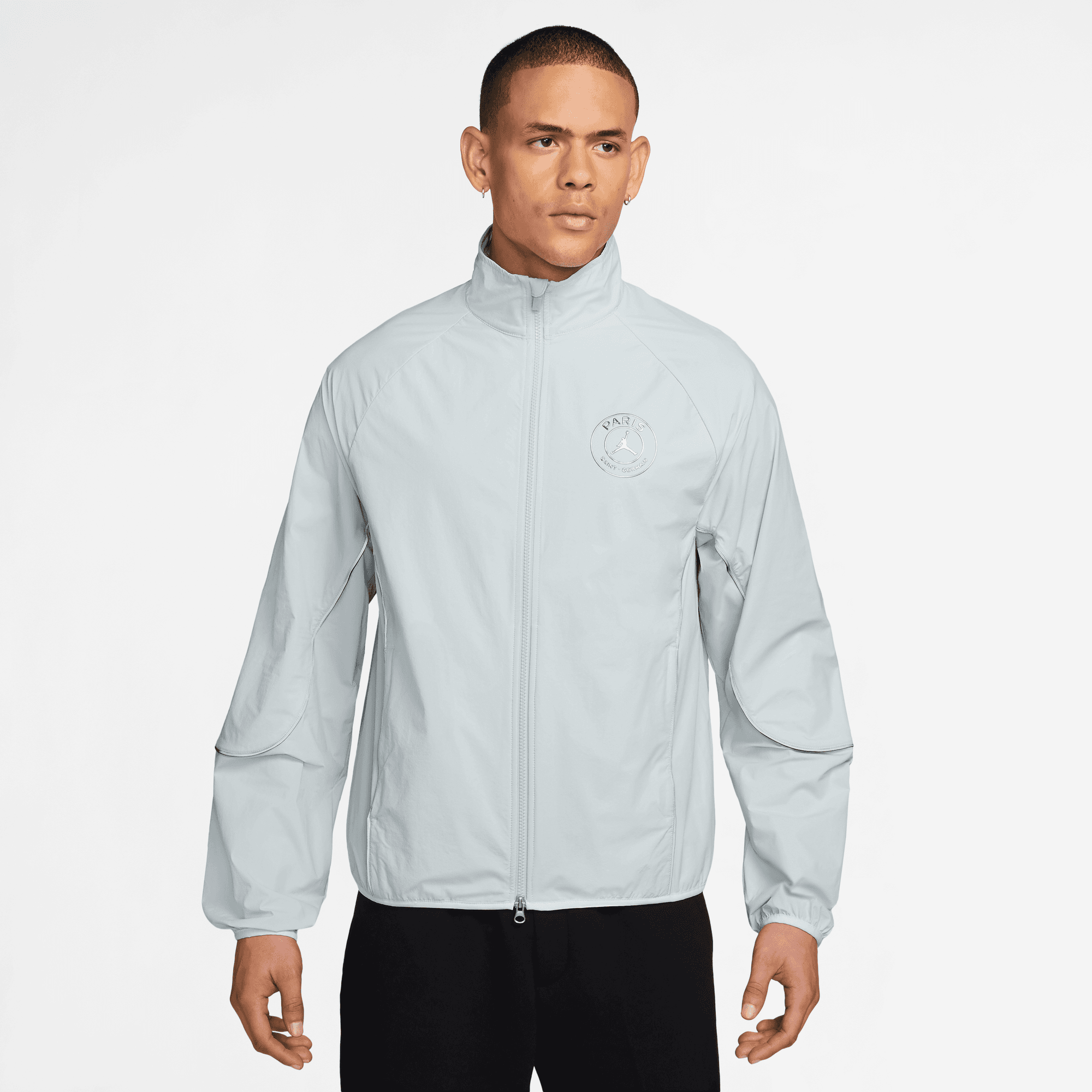 Veste Anthem PSG 2025/2026 Jordan coloris Pure Platinium avec logo du club et technologie Dri-FIT.