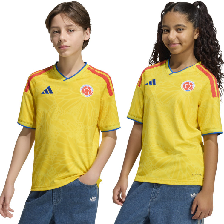 Maillot de football Adidas domicile Colombie saison 2025/2026 pour enfant, coloris jaune traditionnel.