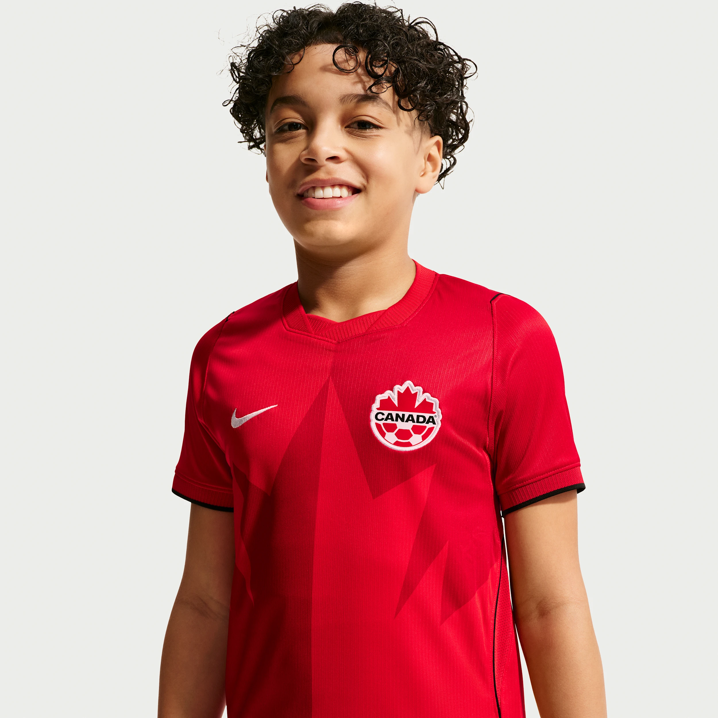 Maillot de football Nike rouge domicile de l'équipe nationale du Canada pour enfant, saison 2026/2027.